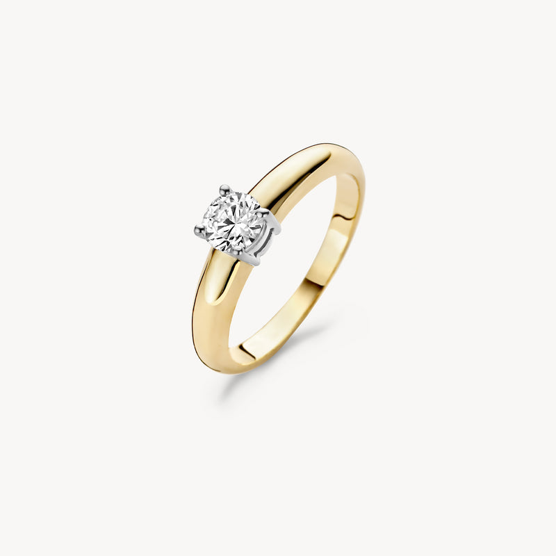 Bicolor ring met 14k geel en wit goud en solitaire zirkonia steen.