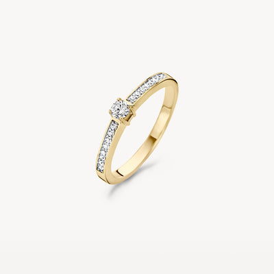 14k geel goud ring met centrale zirkonia en kleine pavé zirkonia aan beide zijden.