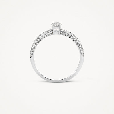 14k wit goud ring met zirkonia en kleine pavé stenen langs band.