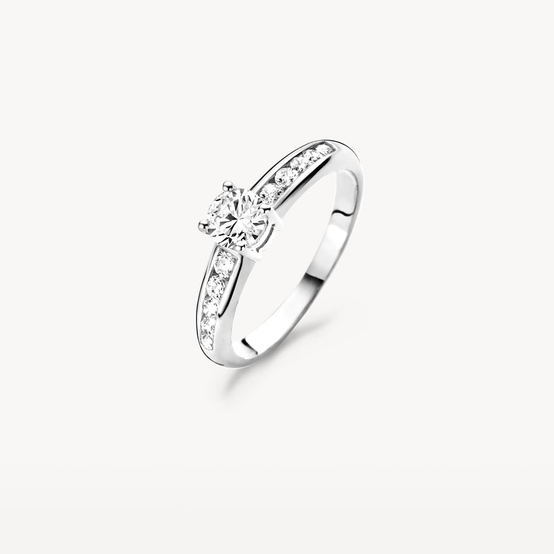 585er Weißgold Ring mit zentraler zirkonia und kleiner zirkoniaam Gürtel.