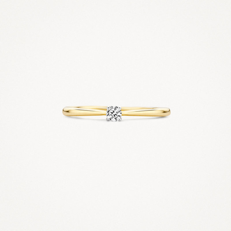 Dunne solitair ring van 14k geel goud met centrale zirkonia in 14k wit goud zetting.
