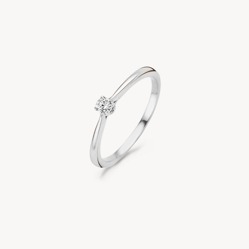 Ring van 14k wit goud met solitaire zirkonia in minimalistisch design.