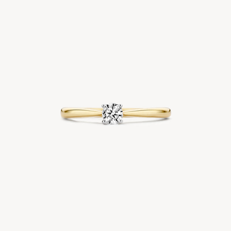14k geelgouden solitair ring met helder zirkonia steentje.