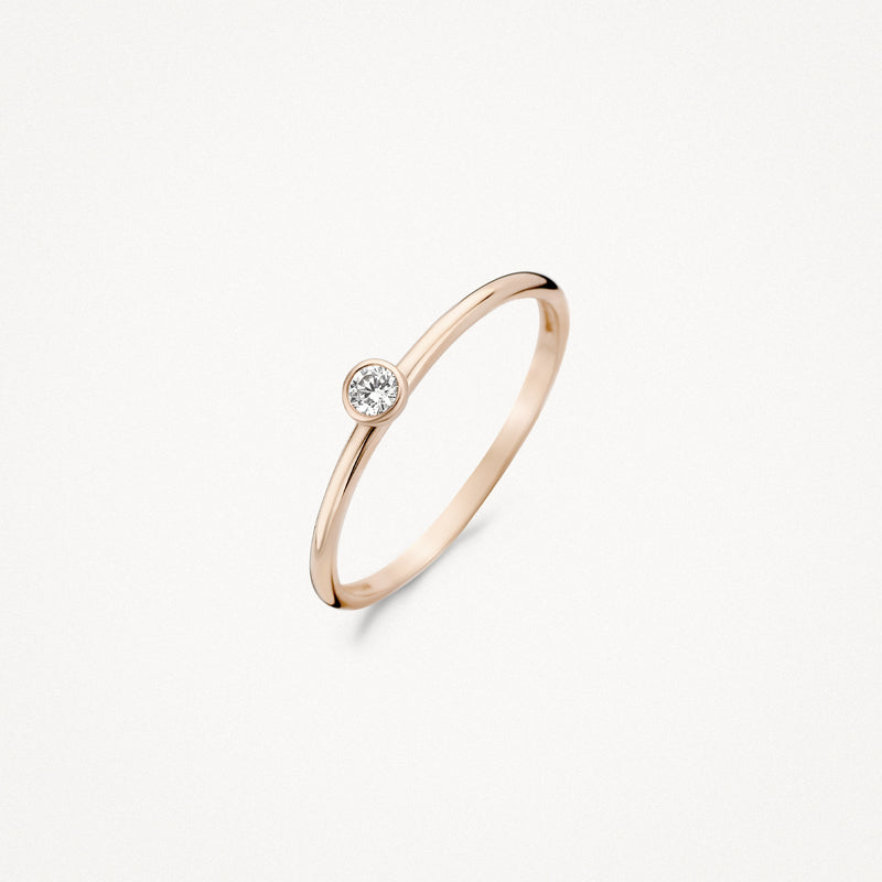 Dunne 14k roségouden ring met kleine zirkonia in bezelzetting.