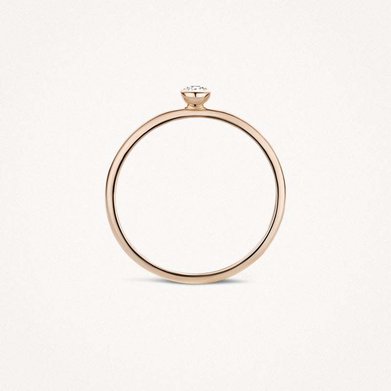 Dunne ring van 14k roségoud met kleine zirkonia bovenop.