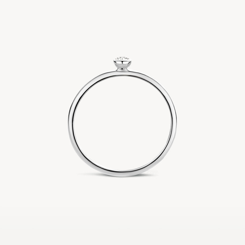 Dunne 14k witgouden ring met kleine zirkonia op smalle band.