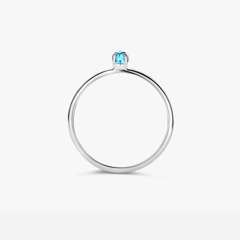 14k witgouden ring met kleine blauwe topaas solitair in maat 46.