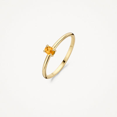 14k goud ring met kleine citrien solitair en dunne band.