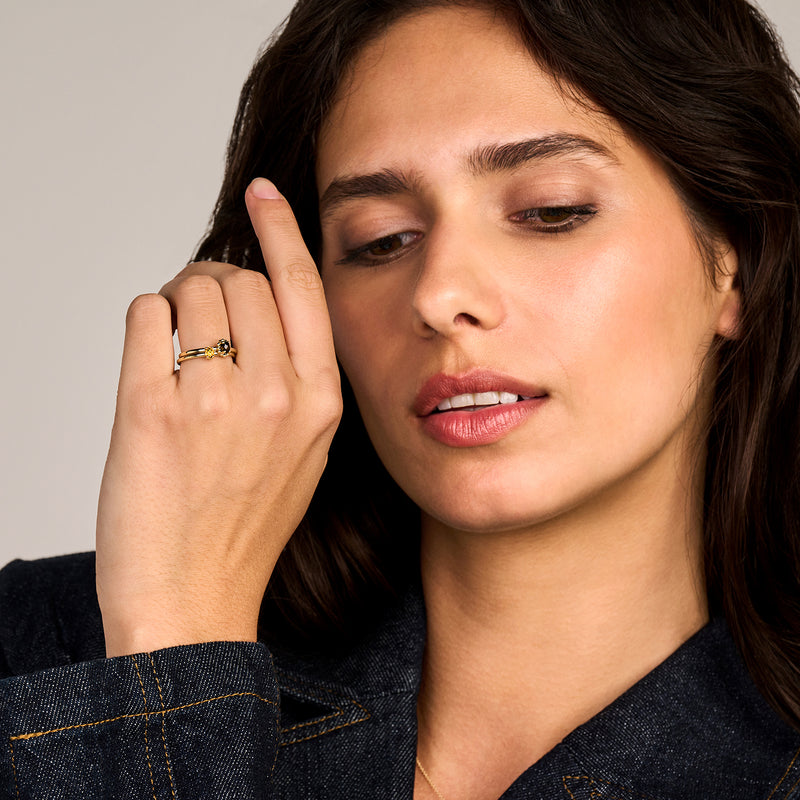 14k geelgouden ring met ovale smokey quartz stenen in solitair ontwerp.