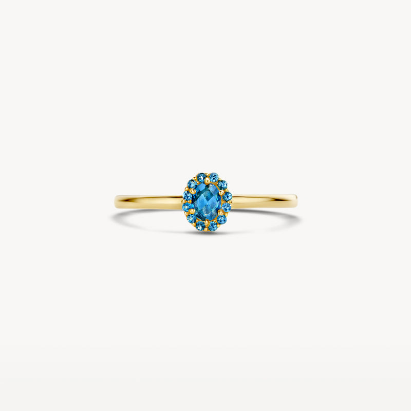 14k geelgouden ring met ovale blauwe topaas en fijne band.