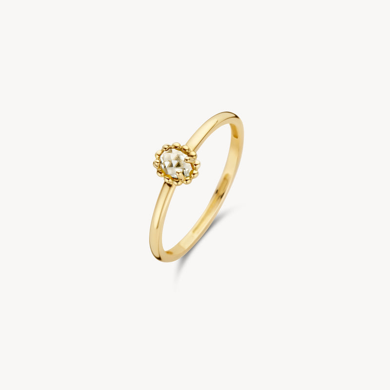 14k geelgouden ring met ovale witte topaas en fijne band.