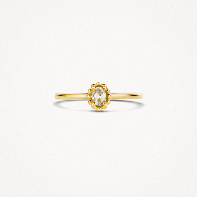 Smal 14k geelgouden ring met ovale witte topaas en geslepen rondom.
