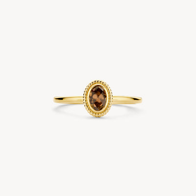14k geelgouden ring met ovale rookkwarts en fijne kralenrand.