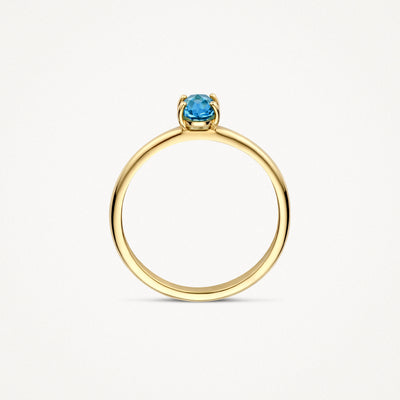 14k geelgouden ring met ronde blauwe topaas solitaire zetting.