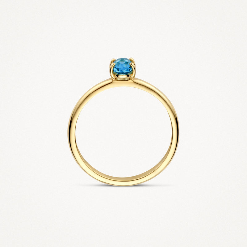 14k geelgouden ring met ronde blauwe topaas solitaire zetting.