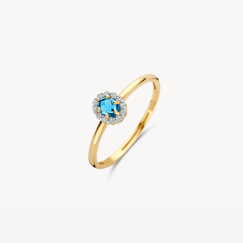 14k geelgouden ring met ovale blauwe topaas en kleine diamanten rondom.