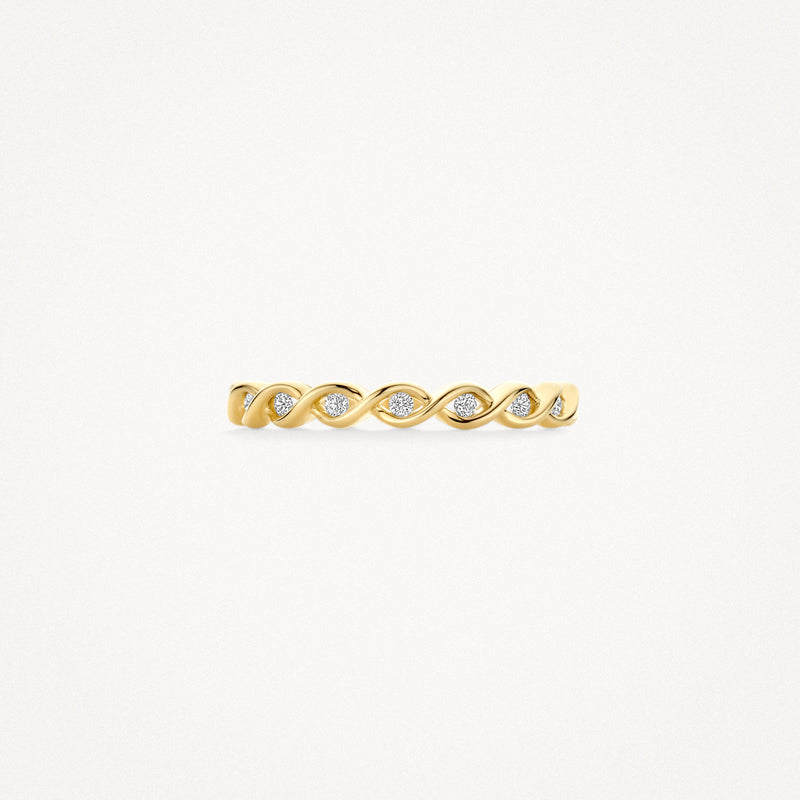 Bague en or jaune 14k avec zircone et anneau torsadé.
