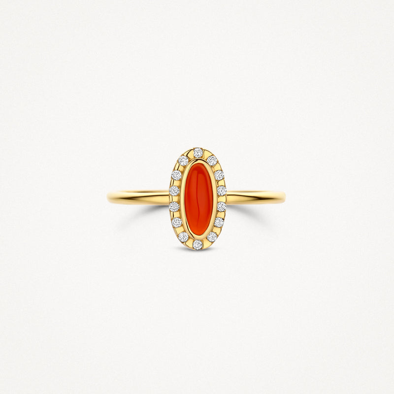 Bague en or 14k avec agate rouge ovale et encadrement de petits diamants.