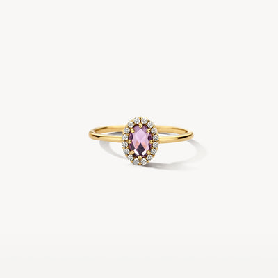 Bague en or 14k avec améthyste et petits diamants de forme ovale.