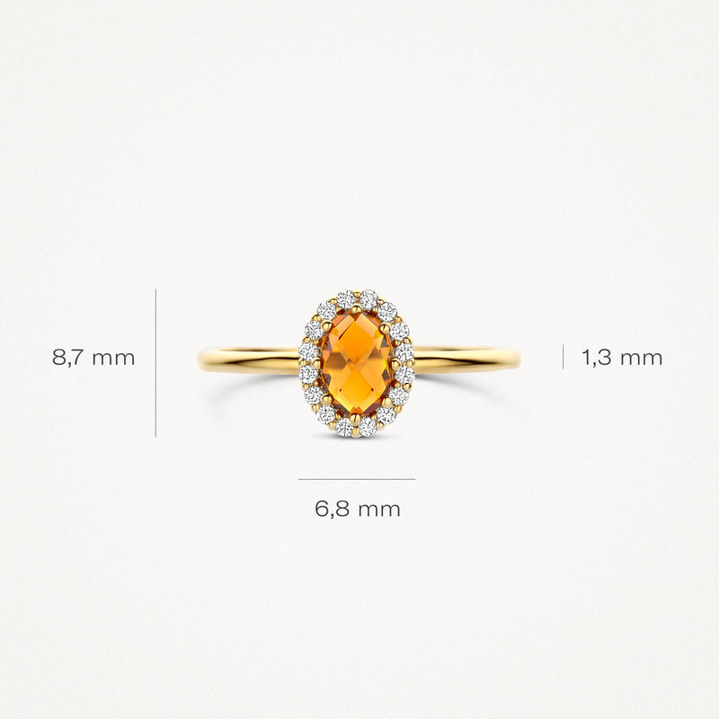 Bague en or 14k avec citrine ovale de Madère et petites pierres scintillantes sur le pourtour.