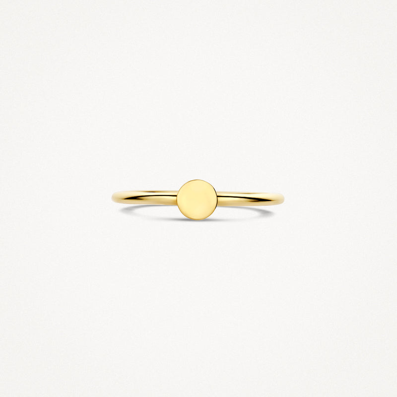 Fine bague à enfiler en or jaune 14k avec petite surface ronde au centre.