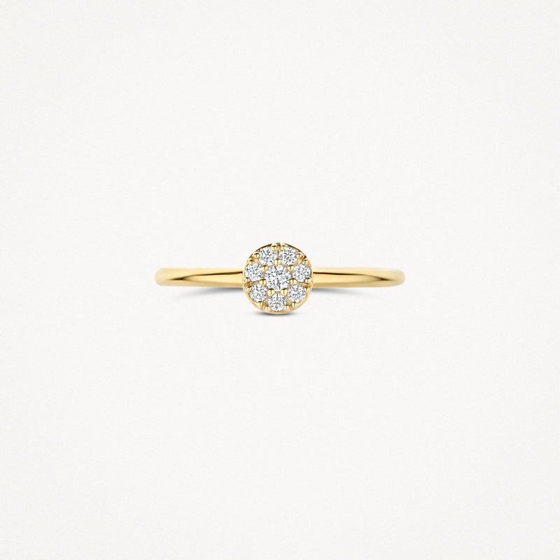 Bague en or 14k avec petites Zircones en serti clos rond.