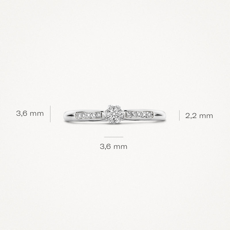 14k Wit goud ring met centrale diamant van 3,6 mm en kleine diamanten aan de band.