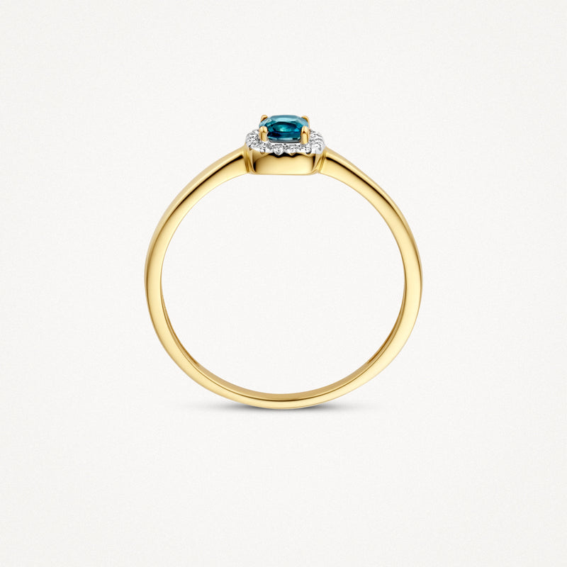 Bicolor ring van 14k goud met London blue topaas en kleine diamanten aan zijkant.