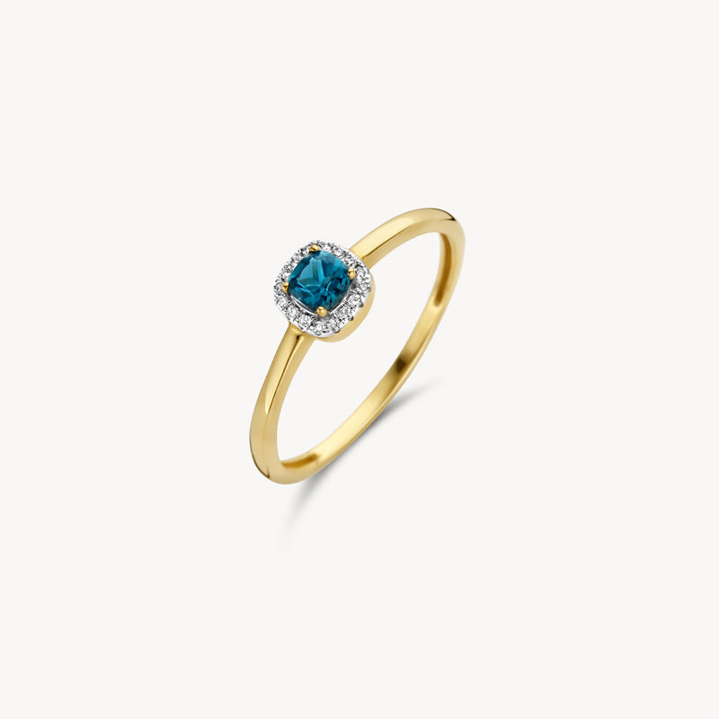 14k geel goud ring met london blue topaz en diamanten halo rondom de steen.