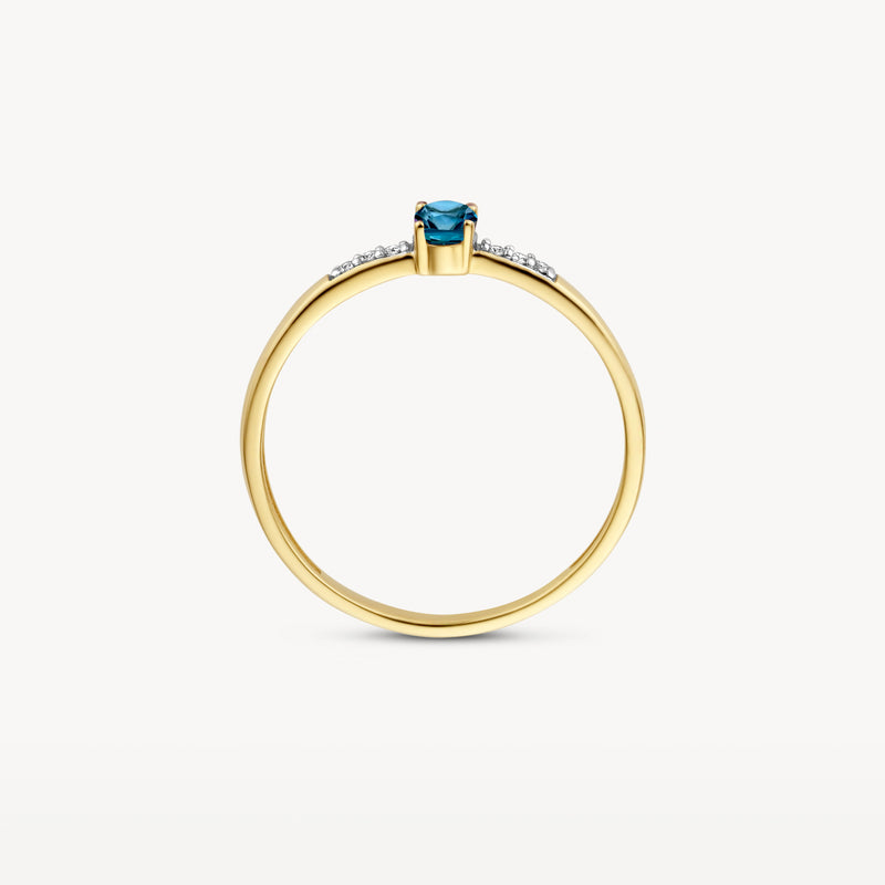 14k geelgouden ring met london blue topaz en kleine diamanten zijkanten.