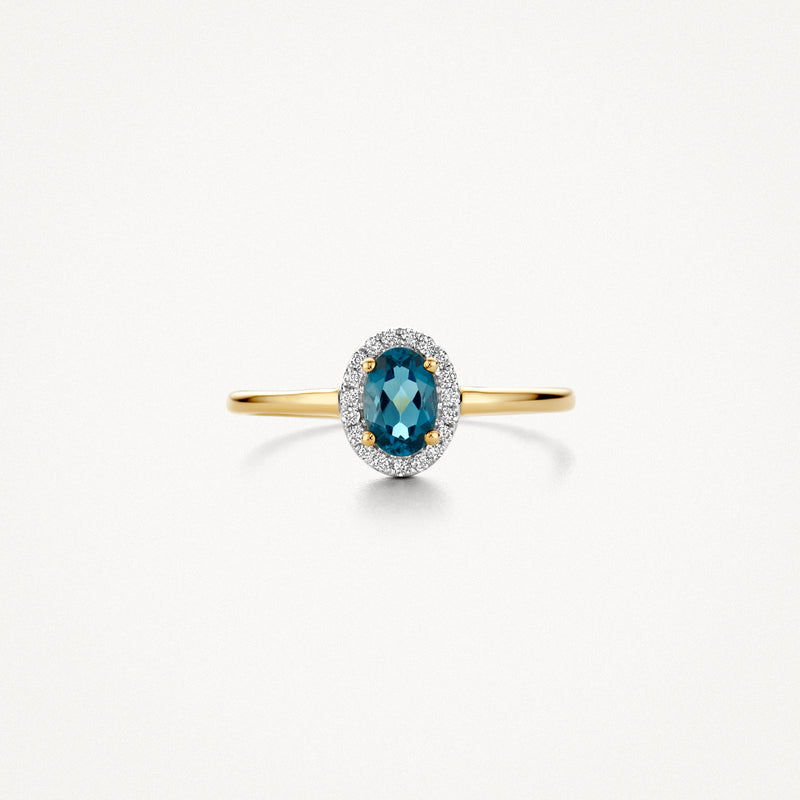 14k geelgouden ring met ovale blauwe topaz omringd door kleine diamanten.