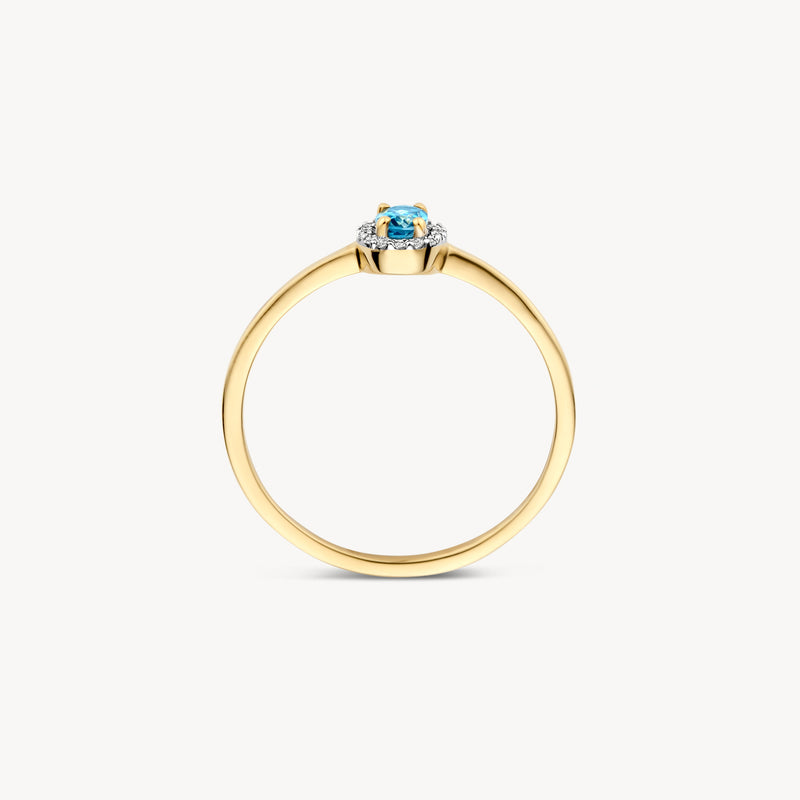 14k geelgouden ring met ronde London blauwe topaas en zilveren zetting.