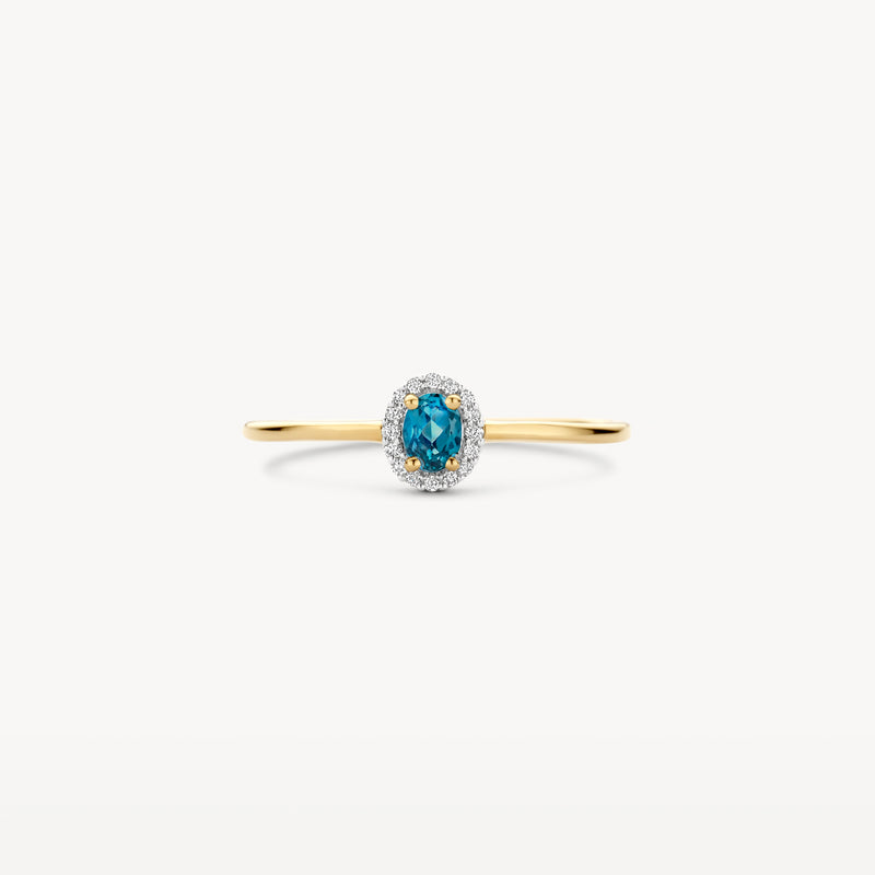 14k geelgouden ring met ovale London blauwe topaas en omliggende diamanten.