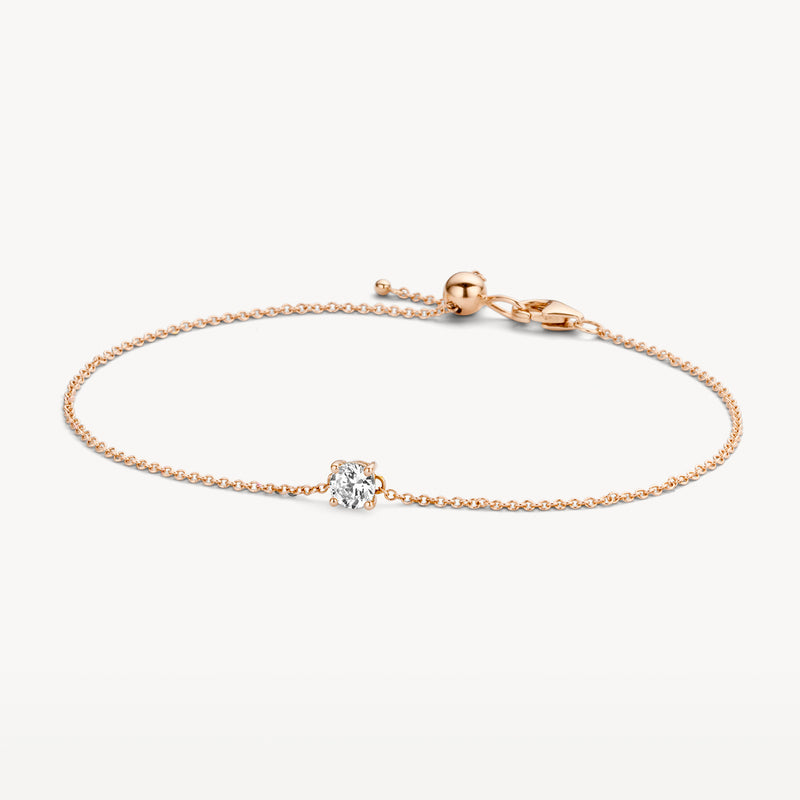 Fijne 14k rosé gouden armband met kleine stralende zirkonia en schakelontwerp.