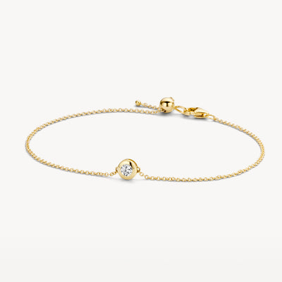 Armband van 14k geelgoud met fijne schakels en zirkonia in het midden.