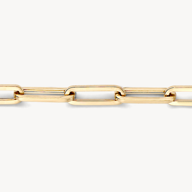 Schakelarmband van 14k geel goud met grove rechthoekige schakels, bicolor goud detail zichtbaar.
