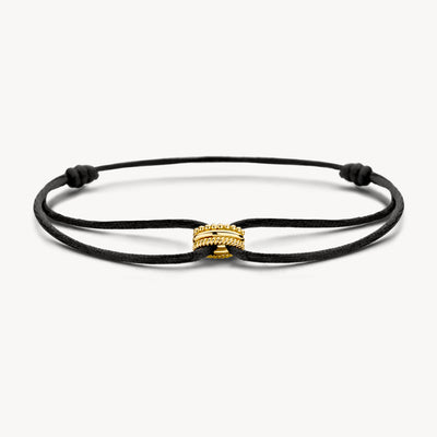 Bracelet avec cordon de soie noire et détail bicolore en or jaune 14k.