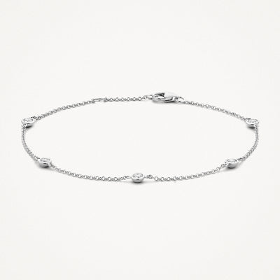 Fijne armband van 14k wit goud met verspreide zirkonia stenen in schakels.