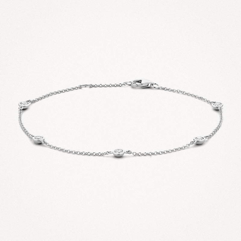 Fijne armband van 14k wit goud met verspreide zirkonia stenen in schakels.