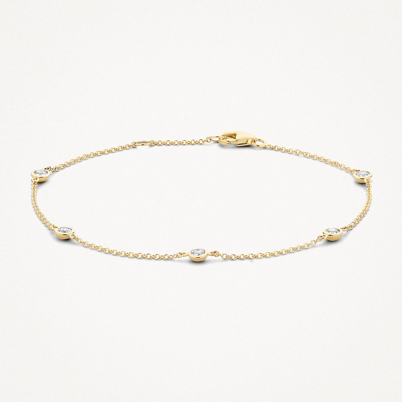 14k goud armband met fijne schakels en vijf zirkonia stenen in bicolor goud.