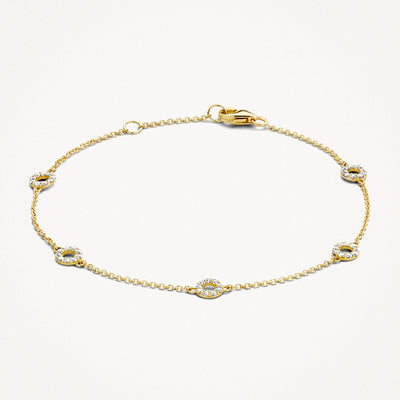 14k geelgouden armband met fijn schakeldraad en vijf zirkonia-accenten in bicolor goud.
