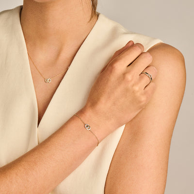 Bicolor goud armband 2223YZI met fijne schakels en zirkonia in 14k goud.