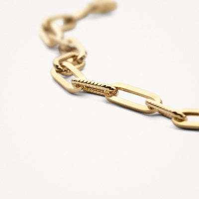 14k yellow gold bracelet with chunky links and finely detailed accents.