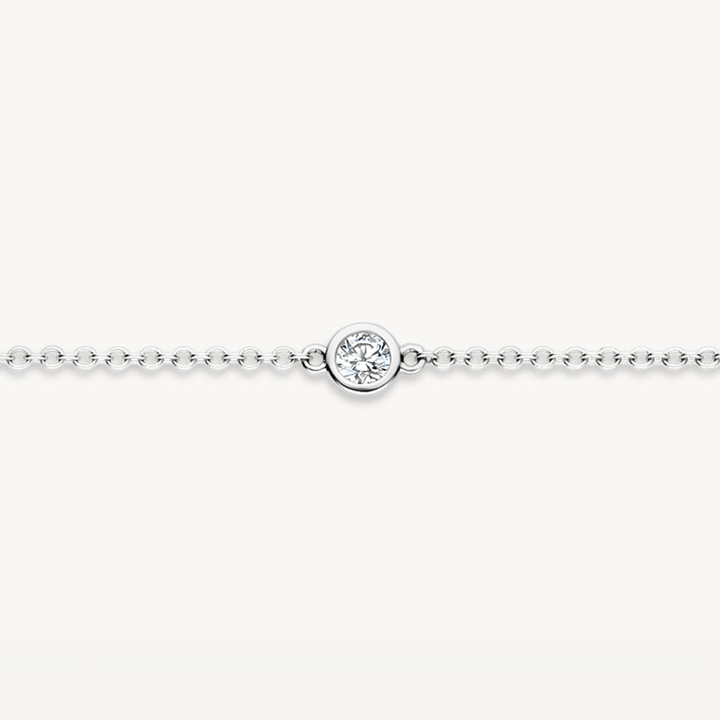 Delicate armband van 14k wit goud met centrale zirkonia in fijne schakel.