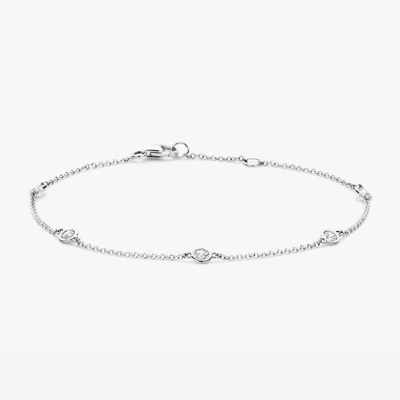 Bracelet délicat en or blanc 14k avec des maillons fins et des petits détails en Zircone.