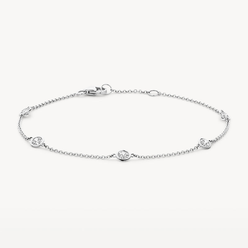 Delicate armband van 14k wit goud met kleine zirkonia schakels en fijne schakelkettinkjes.