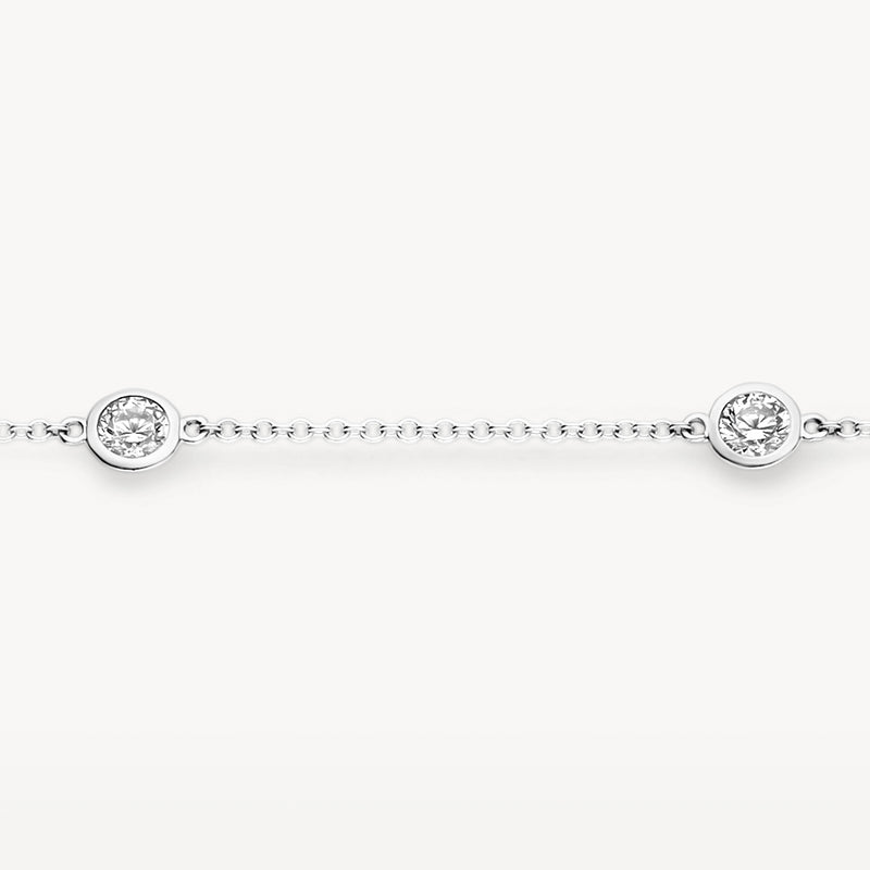 Fijne armband van 14k wit goud met twee ronde zirkonia schakels.