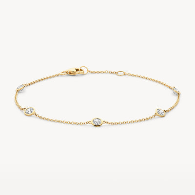 Fijne armband 14k geel goud met drie zirkonia schakels en sluiting.
