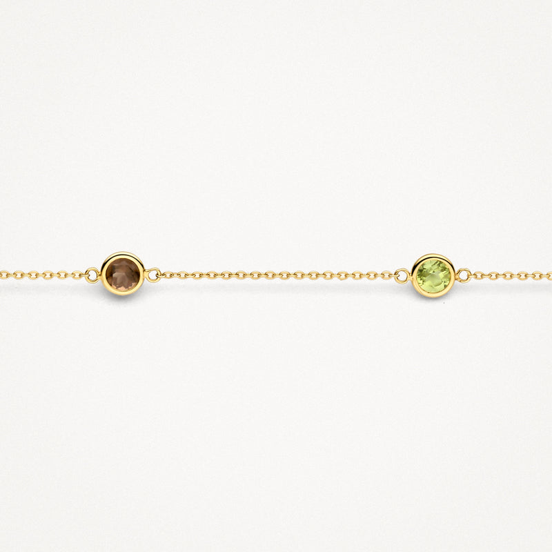 Fijne armband van 14k goud met ronde rookgrijze en lichtgroene stenen gecombineerd.