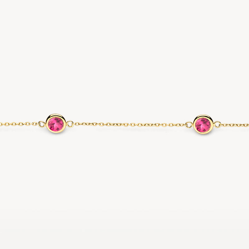 Feines Armband aus 585er Gold mit zwei runden Rhodolithen in Fassung.